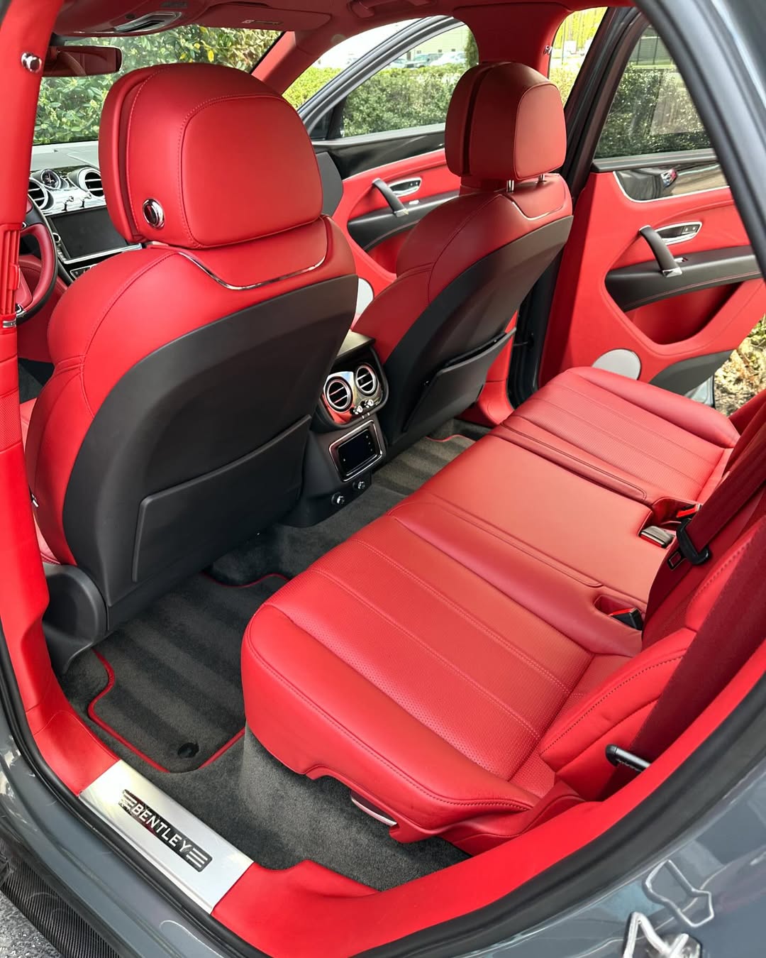 Deep cleaned red leather interior after an interior detail during a detail in Cleveland, Ohio